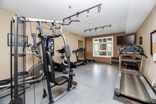 109-5213 61 Street, Red Deer, AB - Indoor Photo Showing Gym Room