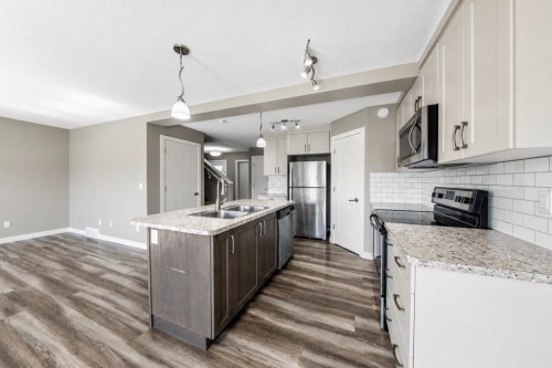 66 Ranchers Close, Lacombe, AB - Indoor Photo Showing Kitchen With Double Sink With Upgraded Kitchen