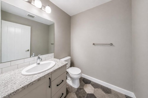 66 Ranchers Close, Lacombe, AB - Indoor Photo Showing Bathroom