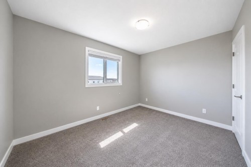 66 Ranchers Close, Lacombe, AB - Indoor Photo Showing Other Room