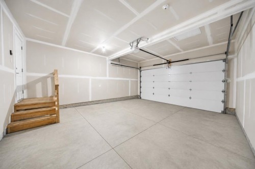 66 Ranchers Close, Lacombe, AB - Indoor Photo Showing Garage