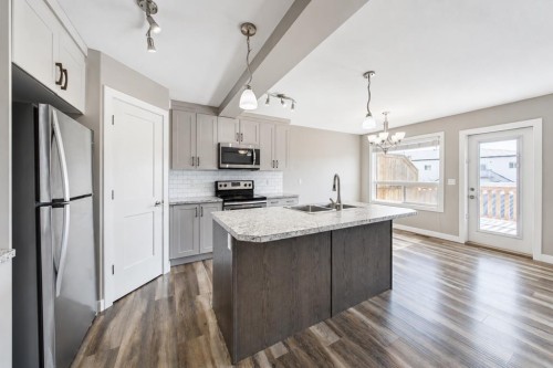 66 Ranchers Close, Lacombe, AB - Indoor Photo Showing Kitchen With Double Sink With Upgraded Kitchen