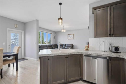 64 Henderson Crescent, Penhold, AB - Indoor Photo Showing Kitchen