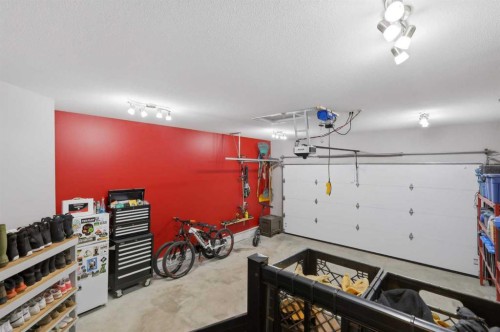 64 Henderson Crescent, Penhold, AB - Indoor Photo Showing Garage