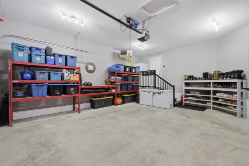 64 Henderson Crescent, Penhold, AB - Indoor Photo Showing Garage