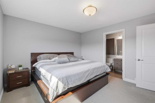 64 Henderson Crescent, Penhold, AB - Indoor Photo Showing Bedroom