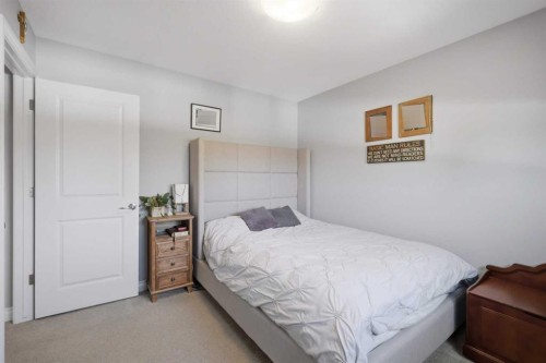 64 Henderson Crescent, Penhold, AB - Indoor Photo Showing Bedroom