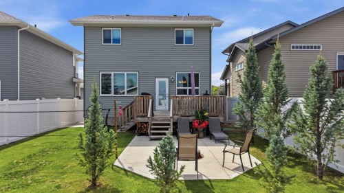 64 Henderson Crescent, Penhold, AB - Outdoor With Deck Patio Veranda