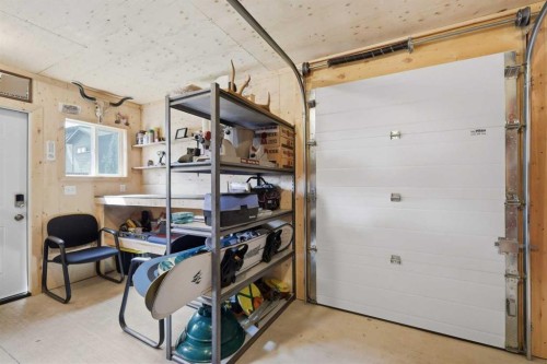 64 Henderson Crescent, Penhold, AB - Indoor Photo Showing Garage