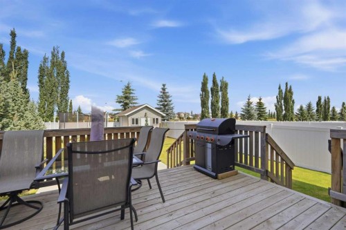 64 Henderson Crescent, Penhold, AB - Outdoor With Deck Patio Veranda With Exterior