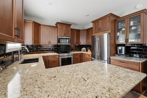 62 Traptow Close, Red Deer, AB - Indoor Photo Showing Kitchen With Stainless Steel Kitchen With Double Sink