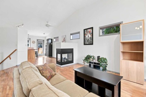 132 Downing Close, Red Deer, AB - Indoor Photo Showing Living Room With Fireplace