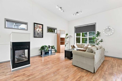 132 Downing Close, Red Deer, AB - Indoor Photo Showing Living Room With Fireplace