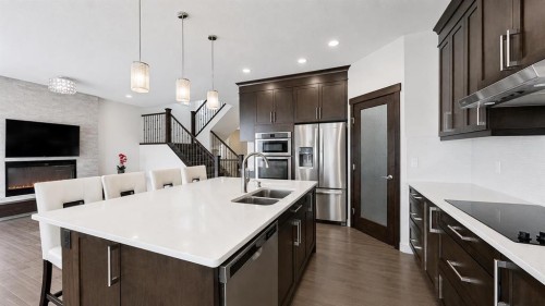 78 Cranarch View Se, Calgary, AB - Indoor Photo Showing Kitchen With Double Sink With Upgraded Kitchen