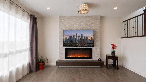 78 Cranarch View Se, Calgary, AB - Indoor With Fireplace