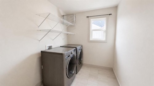 78 Cranarch View Se, Calgary, AB - Indoor Photo Showing Laundry Room