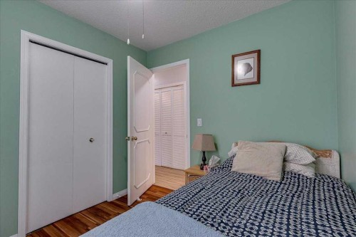 11 West Heights Drive, Didsbury, AB - Indoor Photo Showing Bedroom
