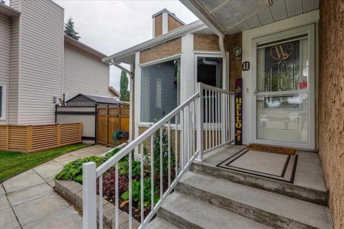 11 West Heights Drive, Didsbury, AB - Outdoor With Deck Patio Veranda With Exterior