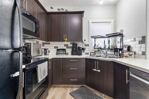 8 Sullivan, Red Deer, AB - Indoor Photo Showing Kitchen With Double Sink