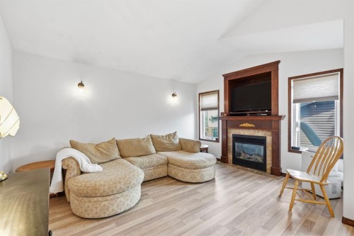 148 Vickers Close, Red Deer, AB - Indoor Photo Showing Living Room With Fireplace