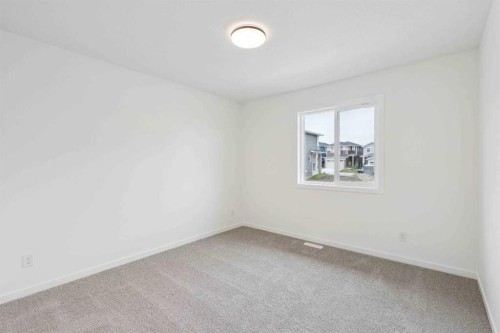 1030 Bayview Crescent Sw, Airdrie, AB - Indoor Photo Showing Other Room