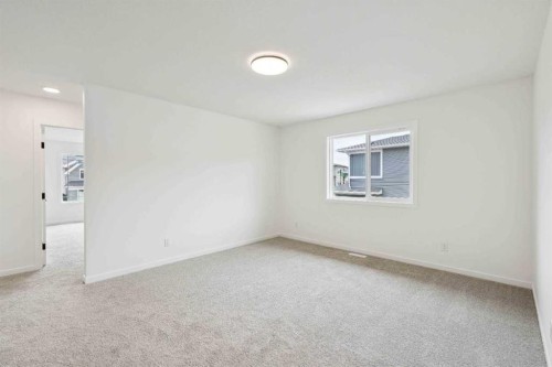 1030 Bayview Crescent Sw, Airdrie, AB - Indoor Photo Showing Other Room