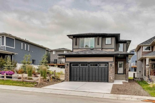 1030 Bayview Crescent Sw, Airdrie, AB - Outdoor With Facade
