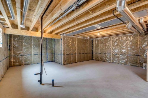 1030 Bayview Crescent Sw, Airdrie, AB - Indoor Photo Showing Basement