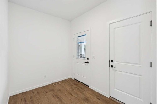 1030 Bayview Crescent Sw, Airdrie, AB - Indoor Photo Showing Other Room