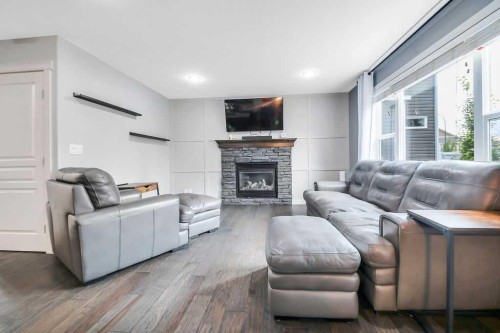 210 Viscount Drive, Red Deer, AB - Indoor Photo Showing Living Room With Fireplace