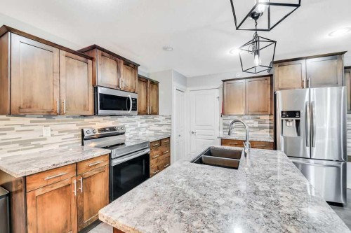 210 Viscount Drive, Red Deer, AB - Indoor Photo Showing Kitchen With Stainless Steel Kitchen With Double Sink With Upgraded Kitchen