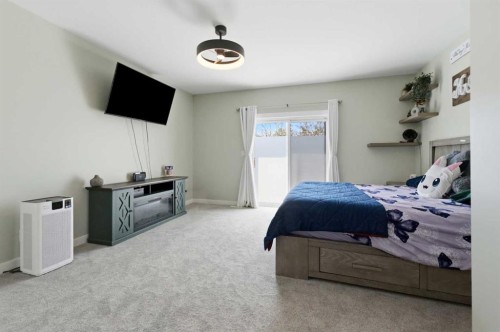 35 Erica Drive, Lacombe, AB - Indoor Photo Showing Bedroom