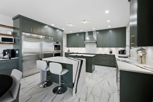 35 Erica Drive, Lacombe, AB - Indoor Photo Showing Kitchen With Upgraded Kitchen
