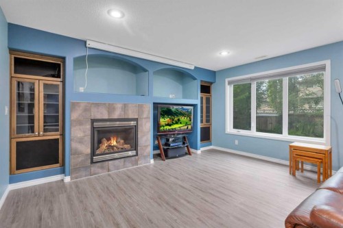 89 Alberts Close, Red Deer, AB - Indoor Photo Showing Living Room With Fireplace