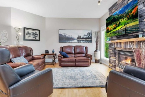 89 Alberts Close, Red Deer, AB - Indoor Photo Showing Living Room With Fireplace