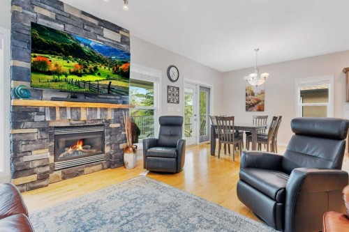 89 Alberts Close, Red Deer, AB - Indoor Photo Showing Living Room With Fireplace
