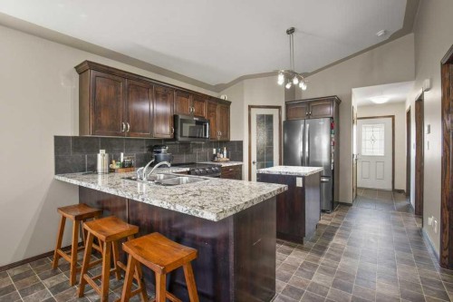 22 Valley Crescent, Blackfalds, AB - Indoor Photo Showing Kitchen With Double Sink With Upgraded Kitchen