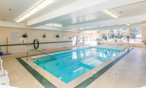 105-4512 52 Avenue, Red Deer, AB - Indoor Photo Showing Other Room With In Ground Pool