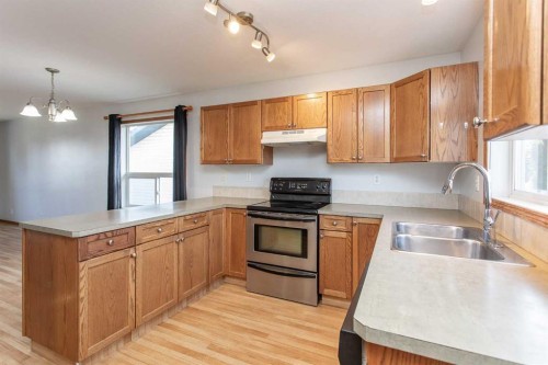 273 Kendrew Drive, Red Deer, AB - Indoor Photo Showing Kitchen With Double Sink