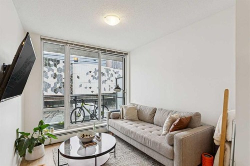 503-450 8 Avenue Se, Calgary, AB - Indoor Photo Showing Living Room