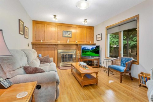 19 Mayberry Close, Red Deer, AB - Indoor Photo Showing Living Room With Fireplace