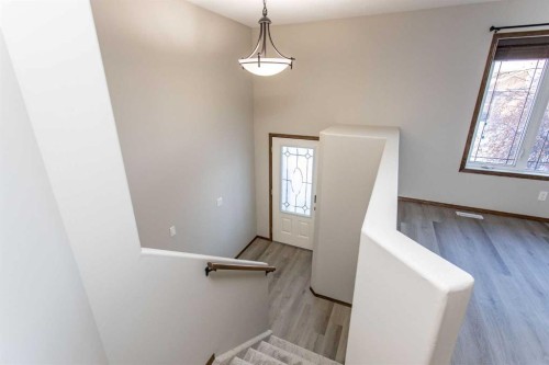 92 Iron Wolf Boulevard, Lacombe, AB - Indoor Photo Showing Other Room