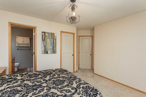 717 Lancaster Drive, Red Deer, AB - Indoor Photo Showing Bedroom