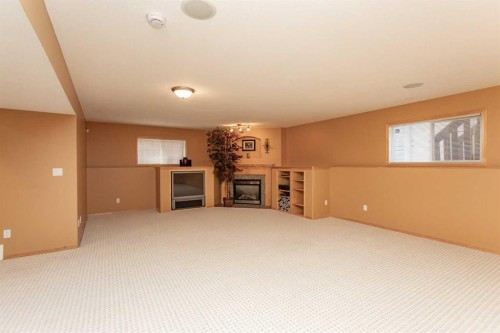717 Lancaster Drive, Red Deer, AB - Indoor With Fireplace