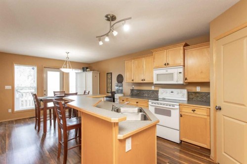 717 Lancaster Drive, Red Deer, AB - Indoor Photo Showing Kitchen With Double Sink