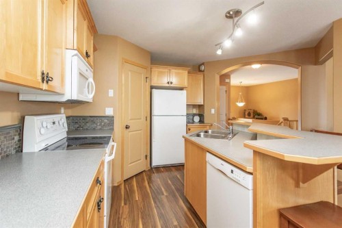 717 Lancaster Drive, Red Deer, AB - Indoor Photo Showing Kitchen With Double Sink
