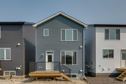 467 Buffaloberry Manor Se, Calgary, AB - Outdoor With Deck Patio Veranda With Exterior