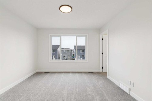 467 Buffaloberry Manor Se, Calgary, AB - Indoor Photo Showing Other Room