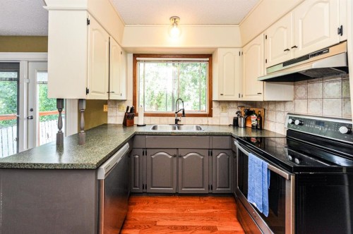 68 Elliott Drive, Camrose, AB - Indoor Photo Showing Kitchen With Double Sink