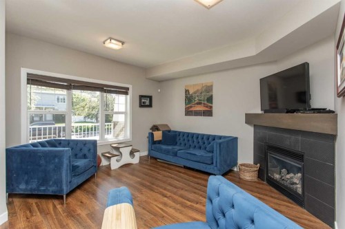 5324 44 Avenue, Red Deer, AB - Indoor Photo Showing Living Room With Fireplace